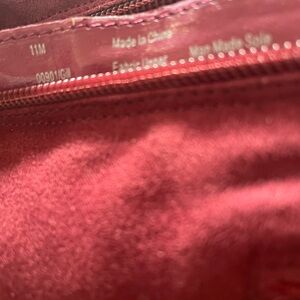 The Size 11 Boots are the color of Cranberry! Worn once and were comfortable!